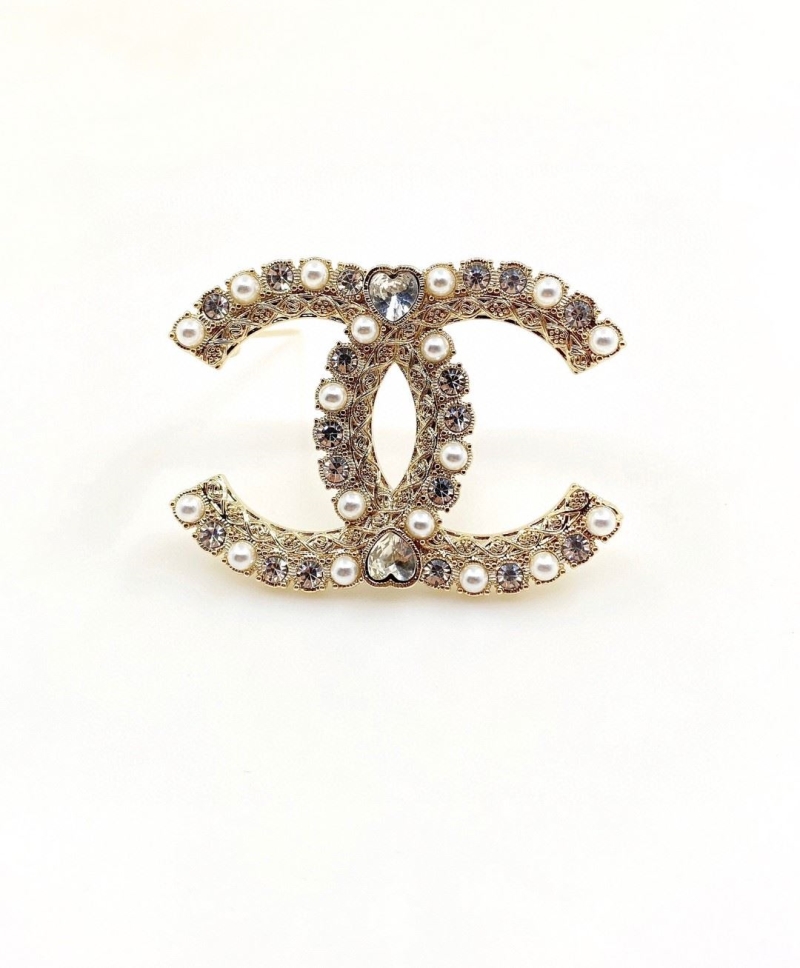 Ch**el brooches